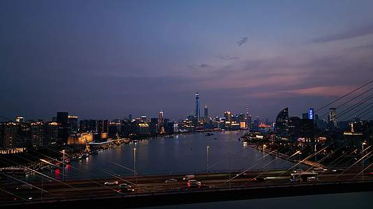 上海杨浦大桥桥梁交通日落夜景4k实景航拍夜景视频的预览图