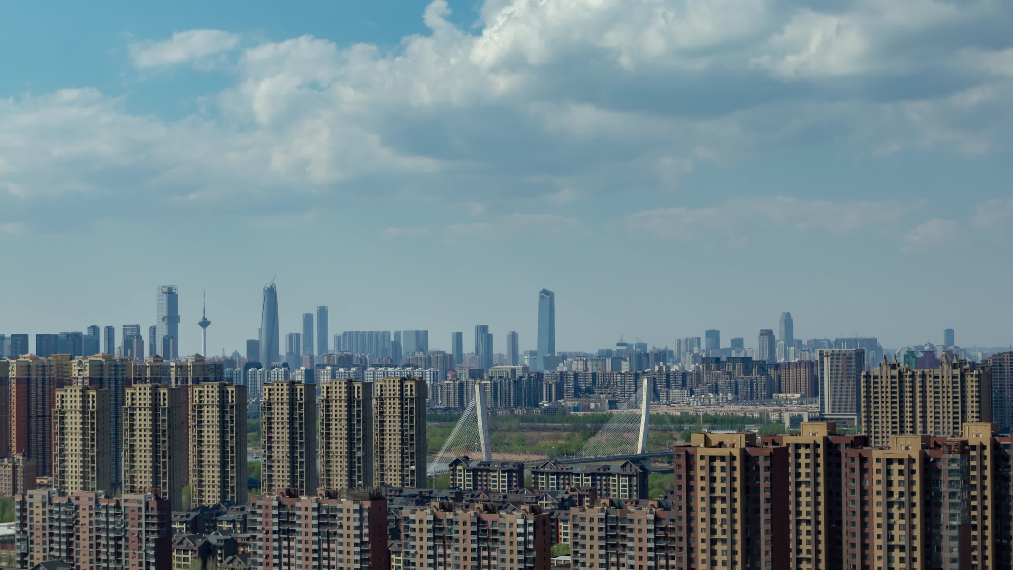 城市建筑天际线蓝天白云富民桥视频的预览图