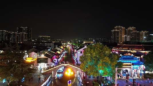 航拍江苏无锡清名桥历史文化街区古运河风景区夜景灯光视频的预览图