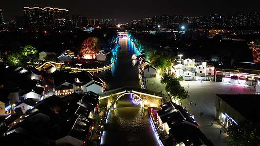 航拍江苏无锡清名桥历史文化街区古运河风景区夜景灯光视频的预览图