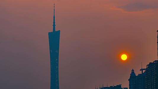 8K广州塔特写日出太阳从塔边升起延时视频的预览图
