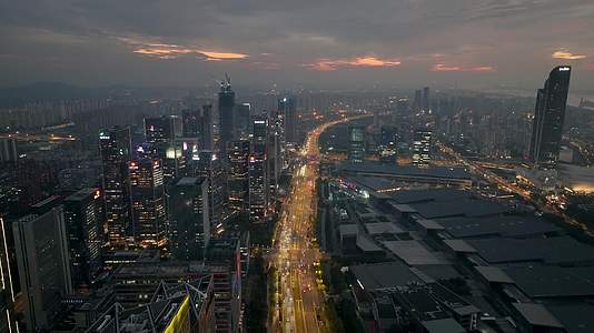 航拍落日晚霞下的南京河西中央商务区视频的预览图