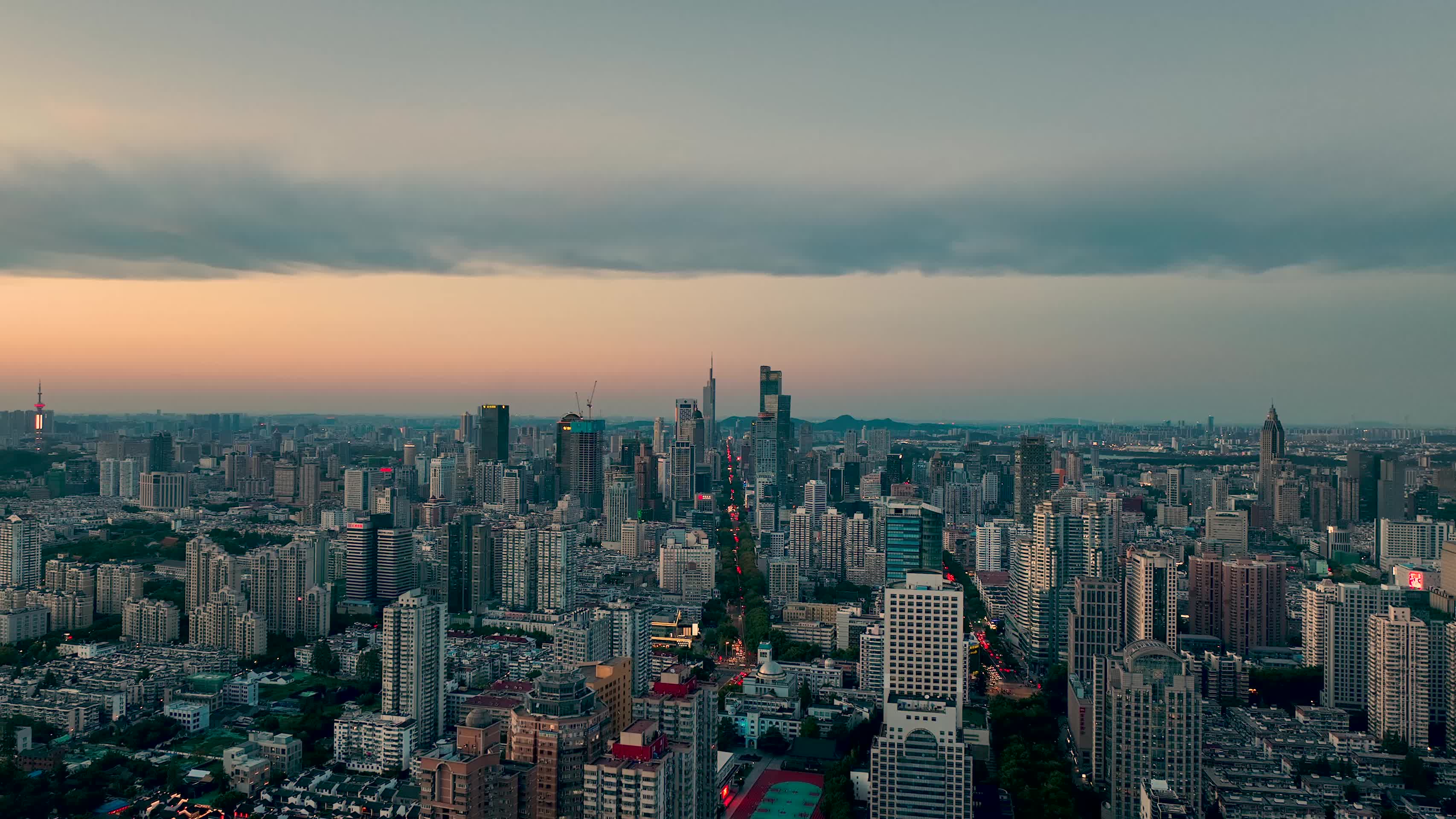 航拍落日蓝调时的南京新街口建筑群视频的预览图