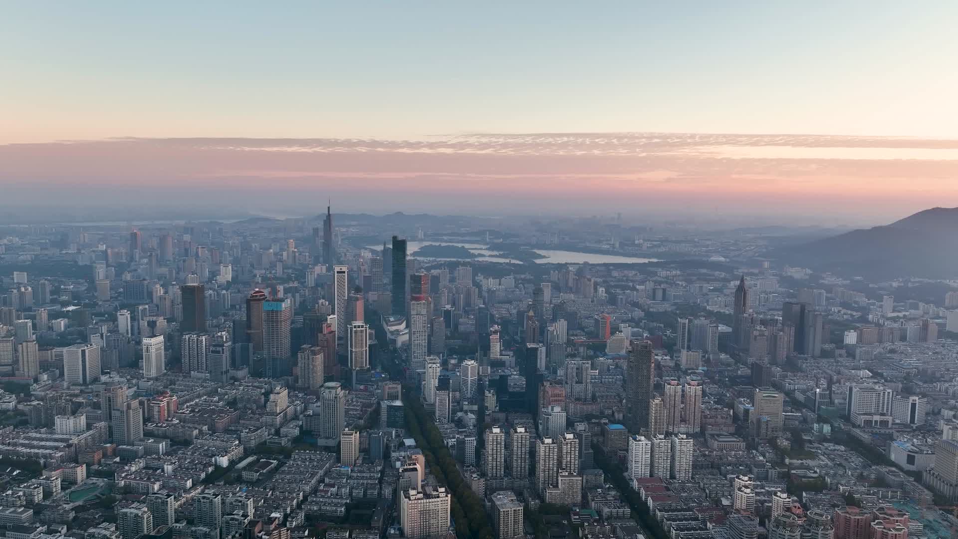 航拍日出朝霞下的南京新街口建筑群视频的预览图