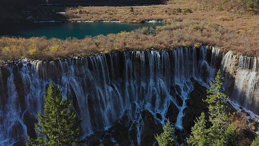航拍秋天的九寨沟诺日朗瀑布和珍珠滩瀑布视频的预览图