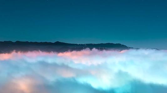 航拍视角云层下的城市夜景视频视频的预览图