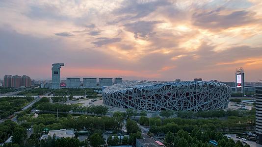北京奥体中心鸟巢日转夜晚霞延时视频视频的预览图