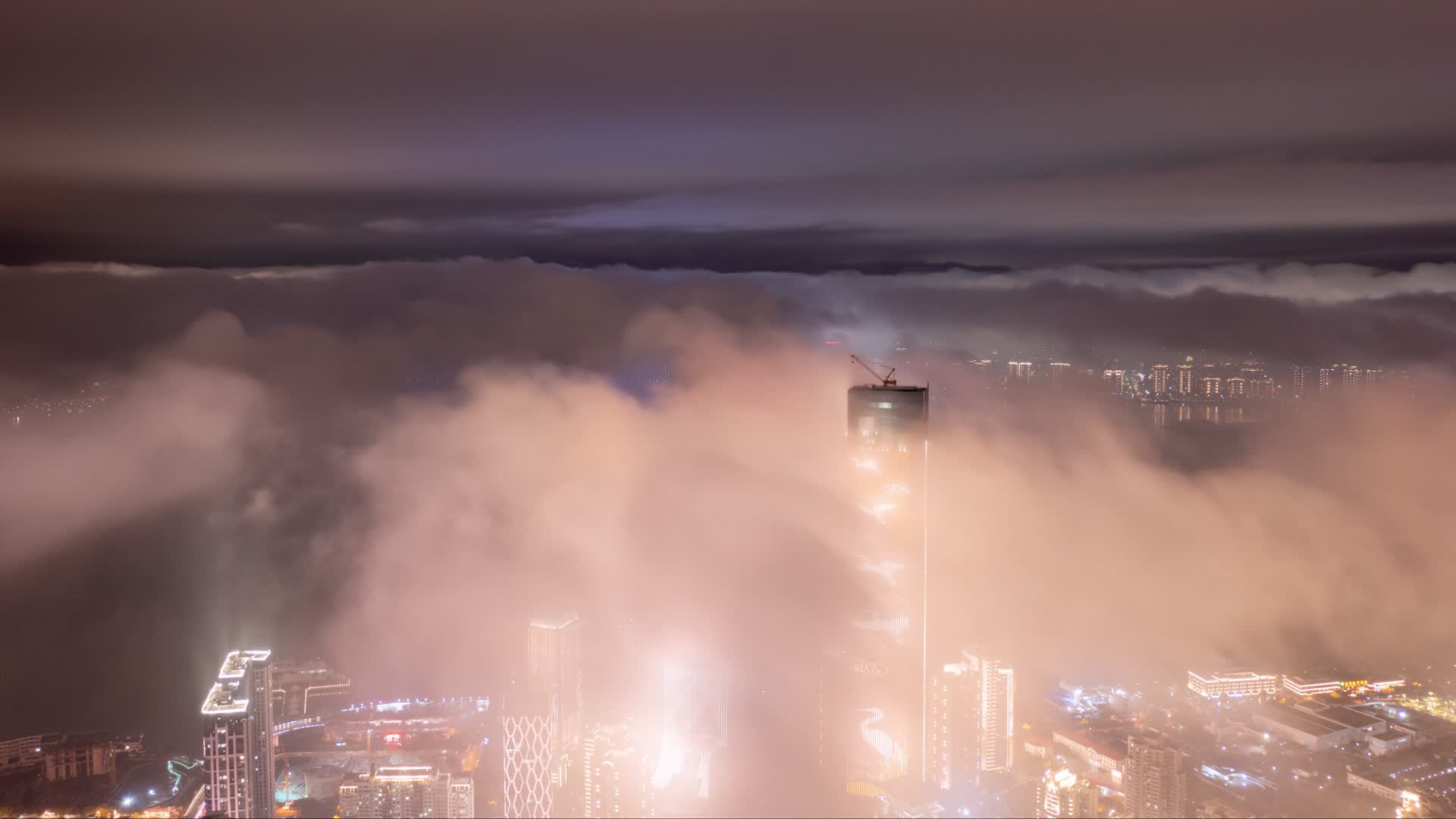 航拍平流雾下的厦门夜景延时视频的预览图