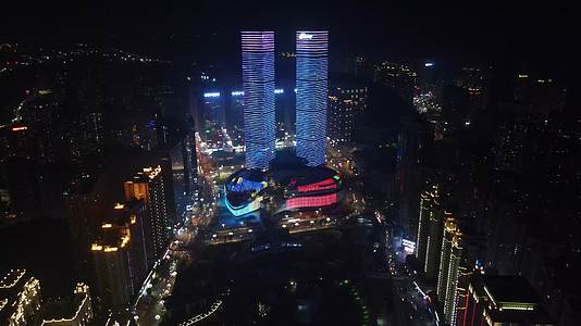4K航拍贵州贵阳花果园双子塔地标建筑夜景灯光秀视频的预览图