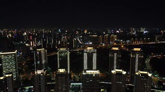 航拍河南郑州会展中心住宅楼夜景灯光视频的预览图