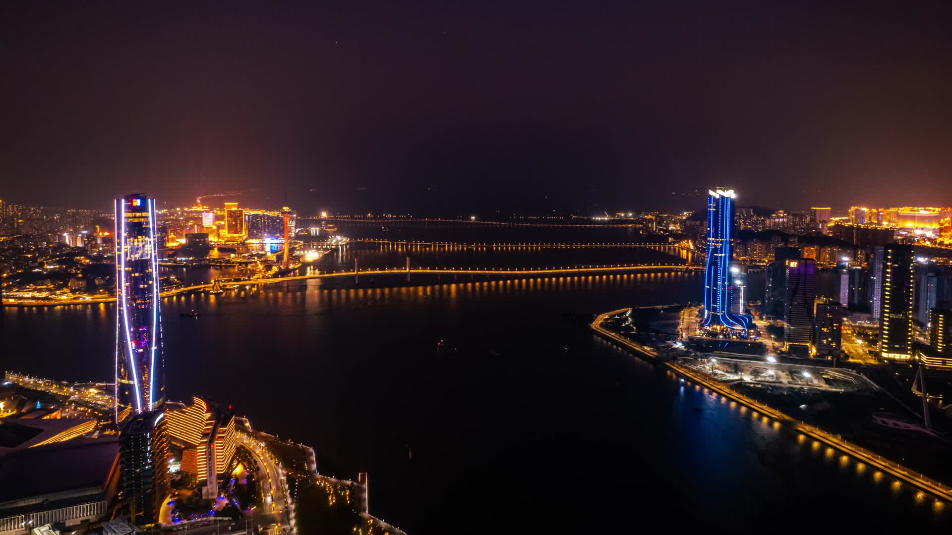 4K珠海十字门眺望澳门夜景城市风光航拍视频视频的预览图