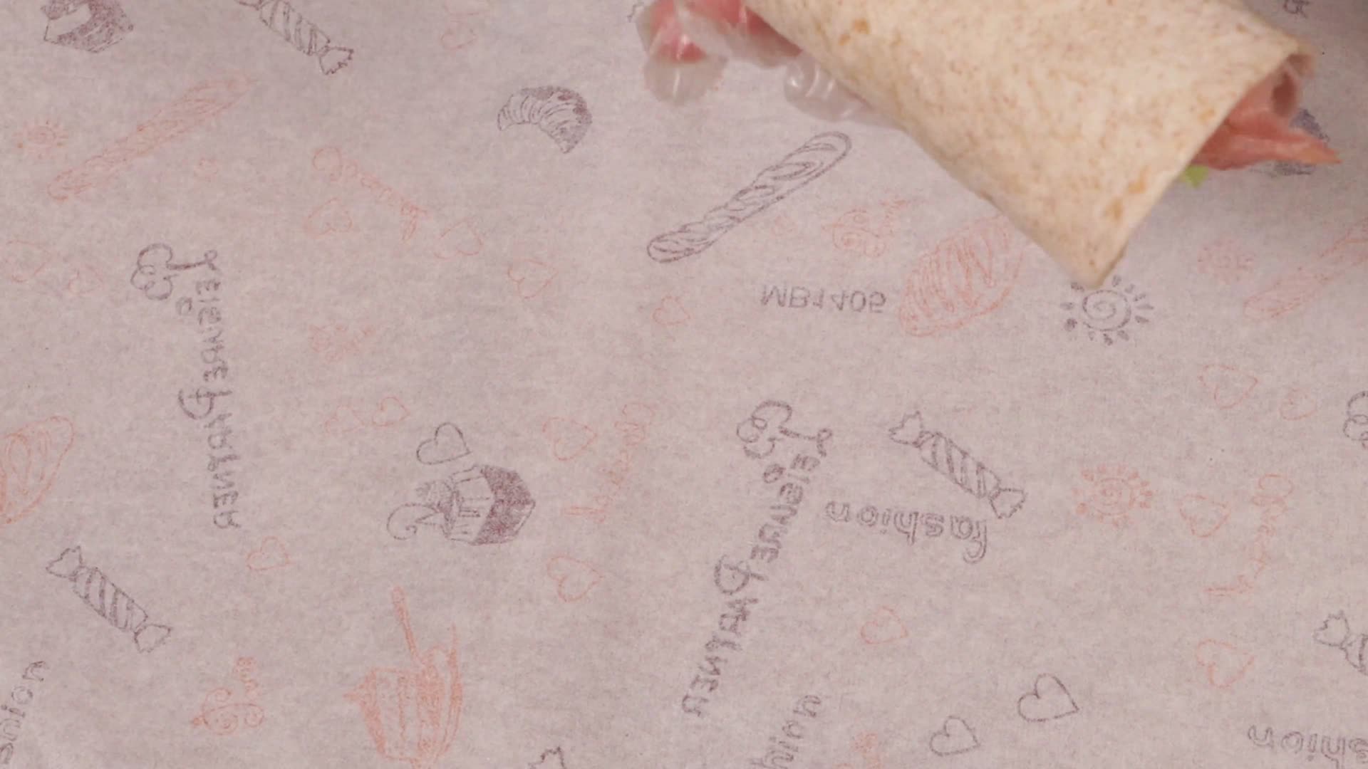 三明治包装纸包装袋包装卷饼塑封视频的预览图