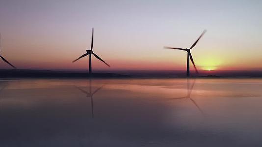 海边风车风力发电黄昏日落唯美航拍视频的预览图
