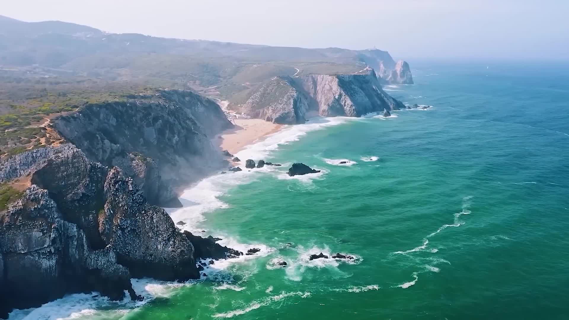 航拍自然风景风光碧海蓝天海岸线海浪冲刷岩石岛屿大海视频的预览图
