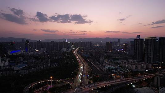 云南昆明城市夜幕降临夕阳晚霞航拍视频的预览图