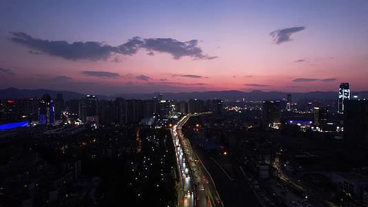 云南昆明城市夜幕降临夕阳晚霞航拍视频的预览图