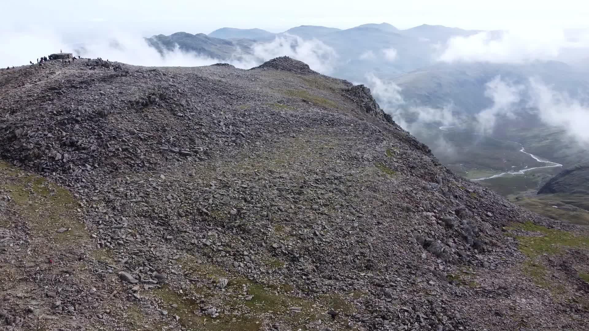群山山顶碎石云雾航拍视频的预览图