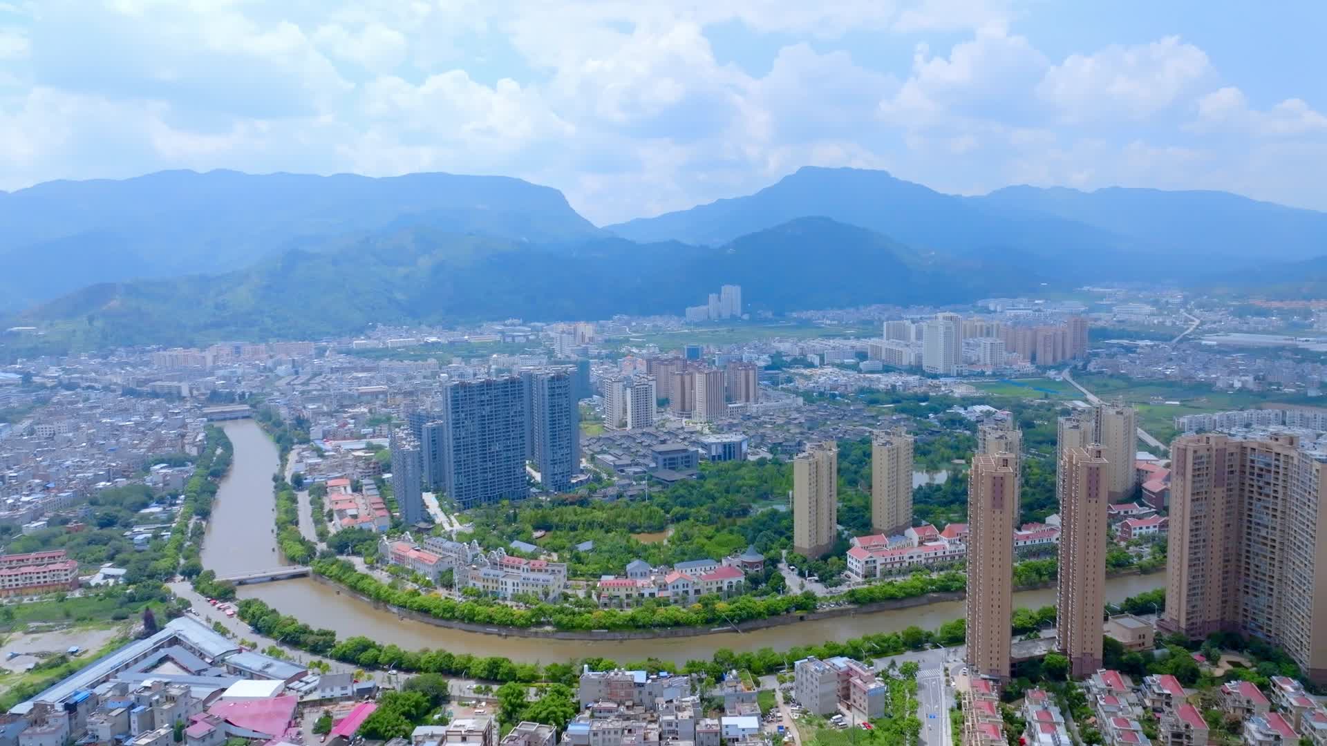 螳螂川富民湿地公园城市地标建筑航拍视频的预览图