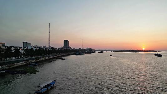 湄公河日出航拍湄公河入海口日出湄公河拉赫缪桥海河入海口江河湖海日出视频的预览图