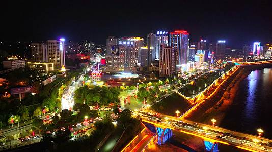航拍陕西安康汉江沿岸夜景高楼大厦视频的预览图