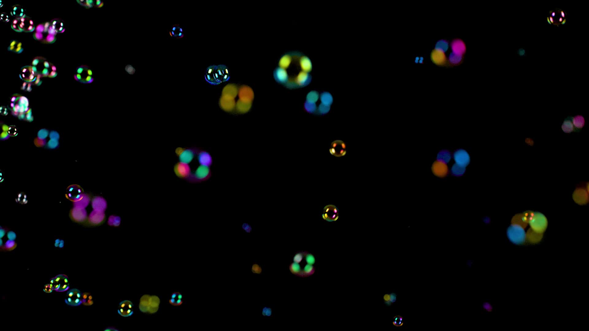左下角飞起的彩色泡泡前后虚焦中间实焦中景别10bit422视频的预览图