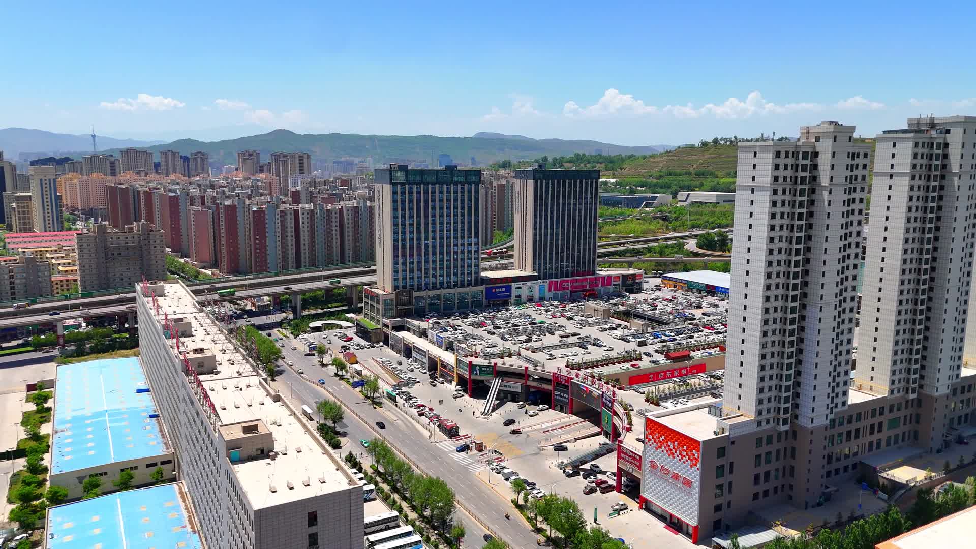 航拍青海西宁城北区万佳家博园视频的预览图