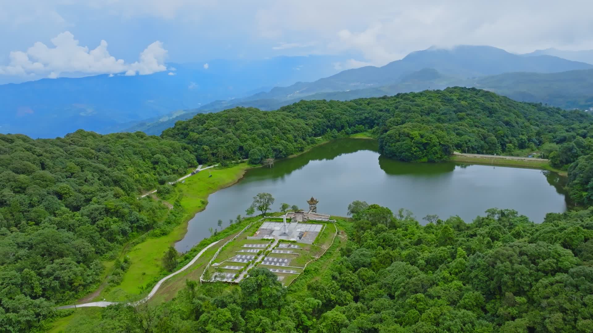 云南普洱西盟佤族佤山天池青山绿水云雾航拍视频的预览图