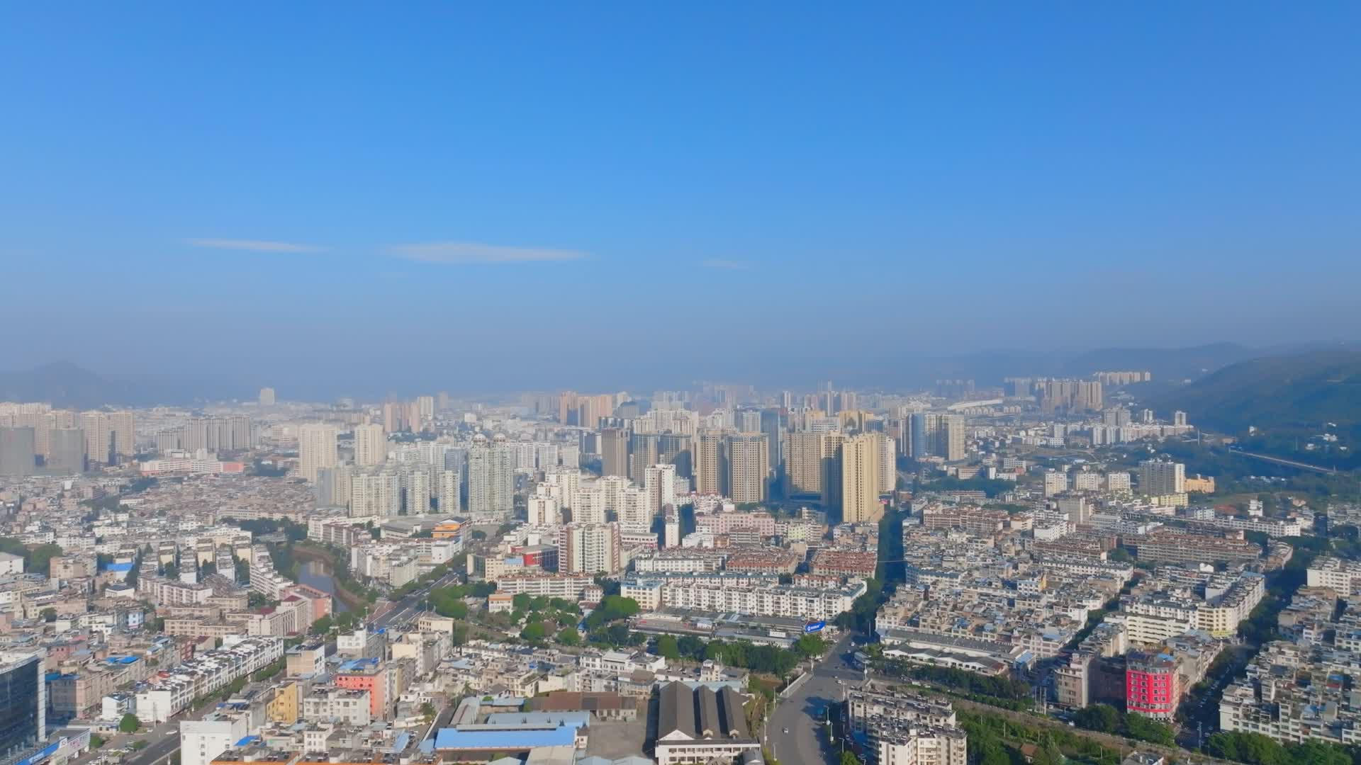 云南文山壮族苗族自治州文山市城市建筑航拍视频的预览图
